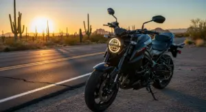 2026 Suzuki GSX-8T in Metallic Black on an open highway during sunset showcasing its retro-modern design.