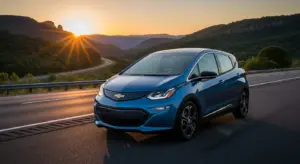 2027 Chevrolet Bolt EV on a highway at sunrise with modern LED lights