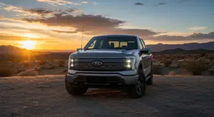 Ford F-150 Lightning STX electric truck showcased outdoors in the U.S., highlighting its rugged new design.